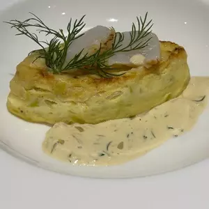 Moelleux de pétoncles à la fondue de poireaux