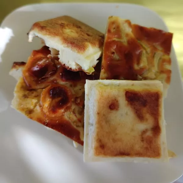 Clafoutis courgette/feta/tomates