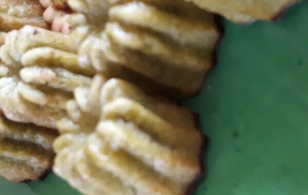Mini-cannelés au pesto et moza