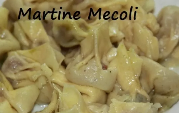 Fagottini au jambon de Parme, accompagnés de leur sauce au parmesan
