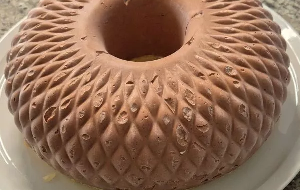 Entremet chocolat poires sur biscuit aux amandes